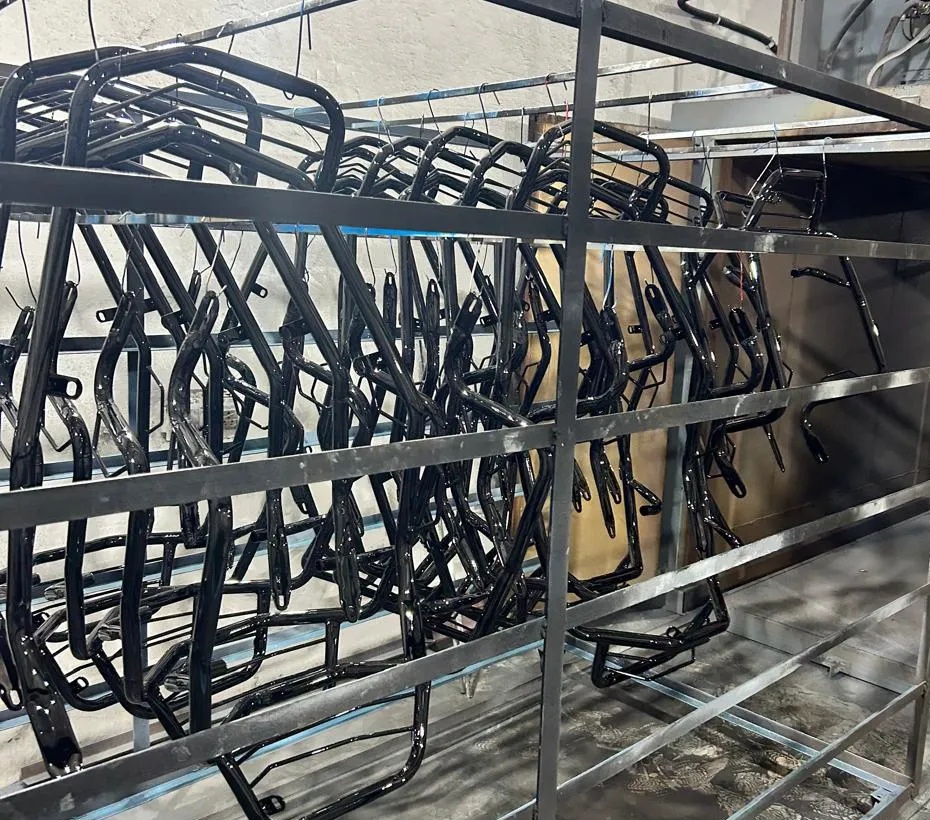 Bike Carriers powder coated in gloss black at Huevex Coatings, Sahibabad